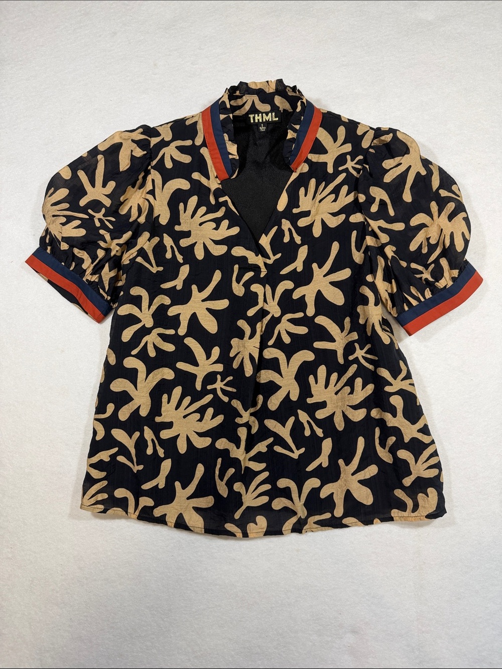 THML Black Blouse with Tan Abstract Floral Print and Red-Trim Accents